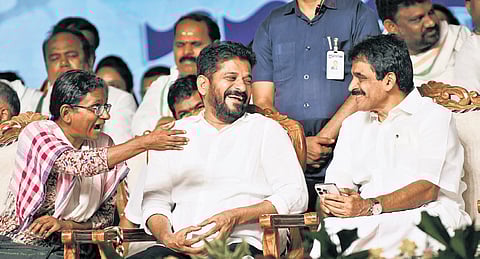 AICC Telangana in-charge Meenakshi Natarajan, CM A Revanth Reddy and AICC general secretary KC Venugopal share a lighter moment during the Samajika Nyaya Samara Bheri public meeting.