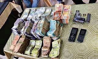The looted cash seized from the miscreants