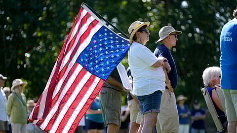 Theresa Peiffer, of Polk City, Iowa, listens to a speaker during an Iowa Democratic Party rally, Thursday, July 3, 2025, in Windsor Heights, Iowa