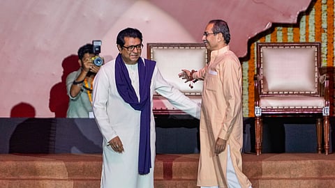 Maharashtra Navnirman Sena (MNS) chief Raj Thackeray, left, and Shiv Sena (UBT) chief Uddhav Thackeray during a joint rally, titled 'Awaj Marathicha', organised by the cousins, in Mumbai, on July 5, 2025.