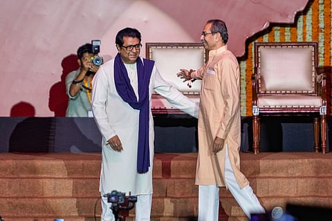 Maharashtra Navnirman Sena (MNS) chief Raj Thackeray, left, and Shiv Sena (UBT) chief Uddhav Thackeray during a joint victory rally, titled 'Awaj Marathicha', organised by the cousins, at Worli area, in Mumbai, Maharashtra, Saturday, July 5, 2025.