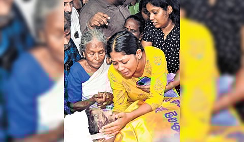 Navami weeps as her mother’s body was brought to their house.