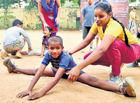 Swarna trains a child at her academy in Hyderabad