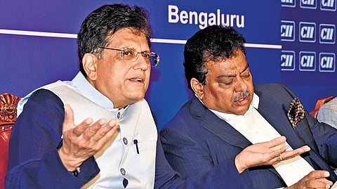 Union Minister for Commerce and Industry Piyush Goyal with Minister of Large and Medium Scale Industries M B Patil at an interactive session with industry leaders in Bengaluru, on Saturday.