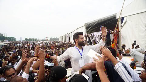 Union Minister and LJP (Ram Vilas) Chirag Paswan waves to the gathering during the 'Bahujan Bhim Sankalp Samagam' rally in Rajgir, June 29, 2025.