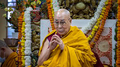 FILE | Tibetan spiritual leader the Dalai Lama presides over an event during which Tibetan exiles prayed for his longevity, a day before his 90th birthday, in Dharamshala, Saturday, July 5, 2025.