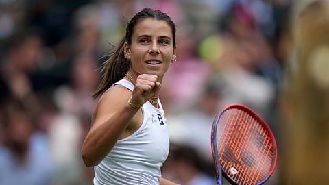 Emma Navarro of the U.S. celebrates winning the women's singles third round match against Barbora Krejcikova of Czech Republic at the Wimbledon Tennis Championships in London, Saturday, July 5, 2025.