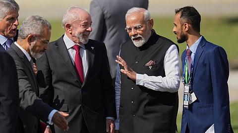 India's Prime Minister Narendra Modi, second from right, chats with Brazilian President Luiz Inacio Lula da Silva during the 17th annual BRICS summit in Rio de Janeiro, Sunday, July 6, 2025.