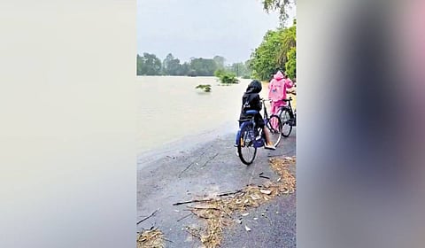 A road submerged in rainwater in Jharsuguda district