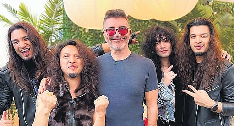 With Simon Cowell; (L-R) Girish Pradhan, Nagen Mongrati, Suraz Karki and Yogesh Pradhan