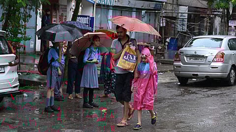 Rain lashes parts of Delhi, NCR in New Delhi on Monday.
