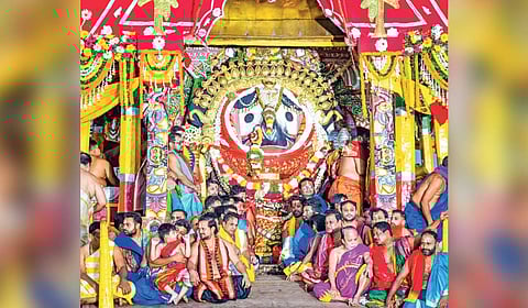 Lord Jagannath decked up in golden attire atop the chariot on Sunday