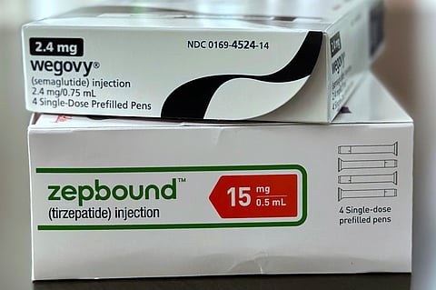 Boxes for the medications Wegovy and Zepbound are arranged for a photograph in California on Thursday, May 8, 2025.