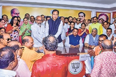 BJP leader Manmohan Samal
filing nomination papers at party
headquarters on Monday.