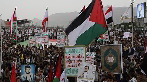 Houthi supporters shout slogans during an anti-U.S. and anti-Israel weekly rally in Sanaa, Yemen, Friday, July 4, 2025.