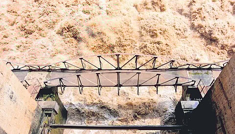 Water gushes out after the crest gates at Jurala were lifted on Monday