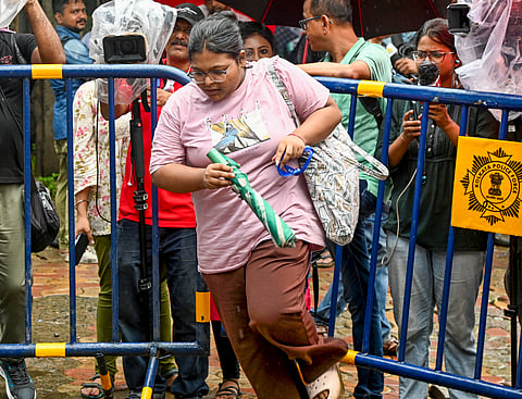 A student arrives at South Calcutta Law College after it reopened following the alleged rape of a student at the campus, in Kolkata, Monday, July 7, 2025.