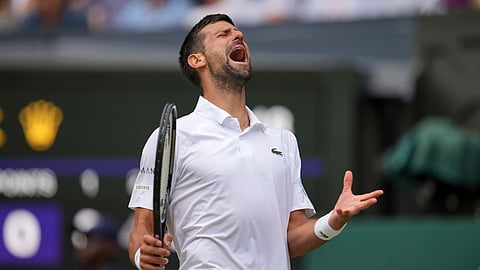 Serbia's Novak Djokovic reacts as he plays Australia's Alex de Minaur during a fourth-round men's singles match at the Wimbledon Tennis Championships in London, Monday, July 7, 2025.