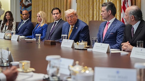 US President Donald Trump, center, speaks during a cabinet meeting at the White House, Tuesday, July 8, 2025, in Washington.