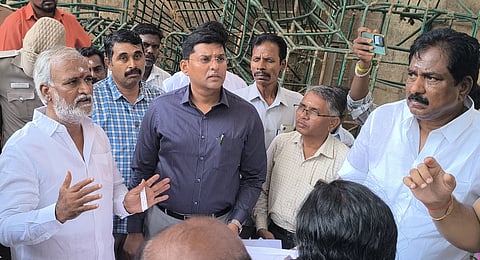 P K Sekar Babu, Minister of Hindu Religious and Charitable Endowment department accompanied by Minister P Moorthi and district collector K J Praveen Kumar inspecting ongoing preparatory works for the Kumbabishekam festival at Thiruparankundram Subramanya Swamy temple on Tuesday