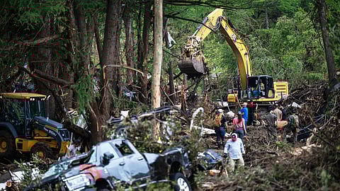 First responders carry out search and rescue operations near the Guadalupe River after a flash flood swept through the area, Monday, July 7, 2025, in Ingram, Texas