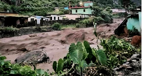Floodwaters from the Moksh Gad stream eroded the foundations of houses built along the banks.