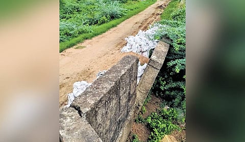 Protection wall at sluice of flood bank collapsed due to rains