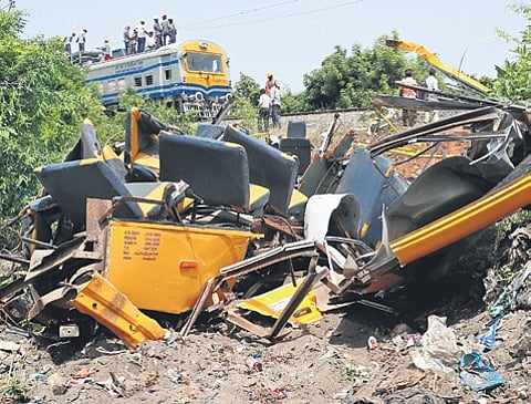 The mangled remains of the school van.