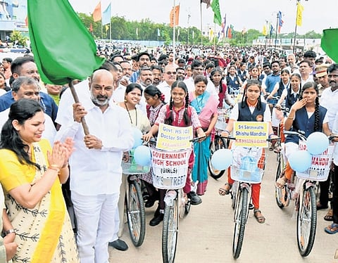 Minister of State for Home Affairs Bandi Sanjay Kumar distributed 20,000 bicycles to Class 10 students at Ambedkar Stadium in Karimnagar.