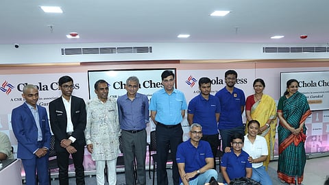 V Anand with Aravind Chdimabarm (extreme left) R Praggnanandhaa (second left) and RB Ramesh at the function