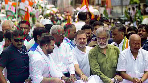 LoP in the Lok Sabha and Congress leader Rahul Gandhi with Bihar party President Rajesh Ram, RJD leader Tejashwi Yadav, CPI General Secretary D Raja, and others takes part in a protest rally during 'Bihar bandh' called by the INDIA bloc