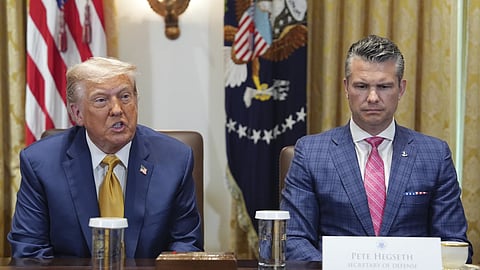 President Donald Trump, left, with Defence Secretary Pete Hegseth.