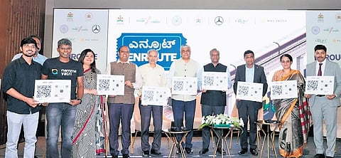IT and BT Minister Priyank Kharge unveils the new public transit features powered by open data in Tummoc and Namma Yatri apps, in Bengaluru on Thursday.