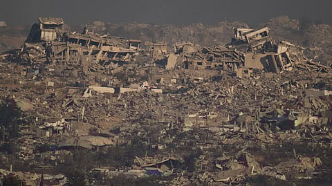 Buildings that were destroyed during the Israeli ground and air operations stand in northern of Gaza Strip as seen from southern Israel, Thursday, July 10, 2025.