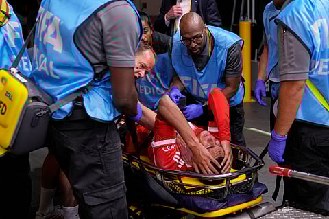Bayern Munich's Jamal Musiala is taken off the field after an injury during the Club World Cup quarterfinal soccer match between PSG and Bayern Munich in Atlanta, Saturday, July 5, 2025.
