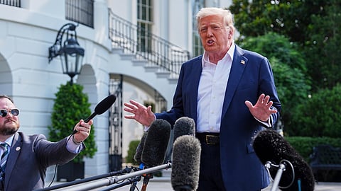 President Donald Trump speaks with reporters before departing the White House, Friday, July 11, 2025, in Washington.