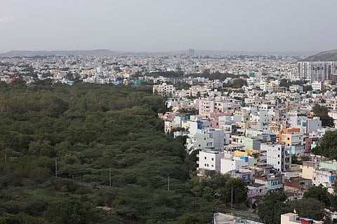12.07.2025 - HYDERABAD - An aerial shot taken from Mahendra hills reveals Hyderabad's two faces, booming concrete clusters and shrinking green lungs.