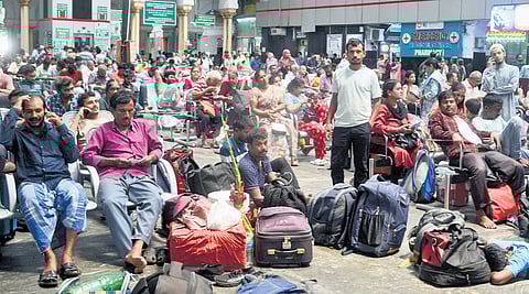 Passengers stranded at Chennai Central station after services were disrupted on Sunday