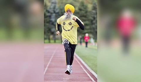 114-year old Fauja Singh.