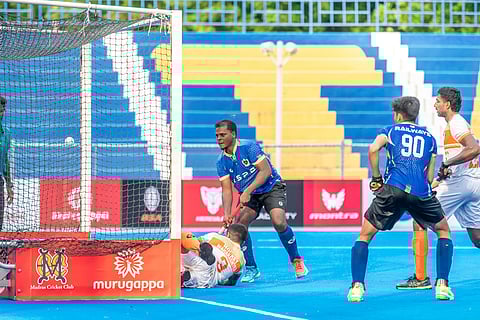 Shanmugam P from Railways scoring the goal against Maharashtra on Monday