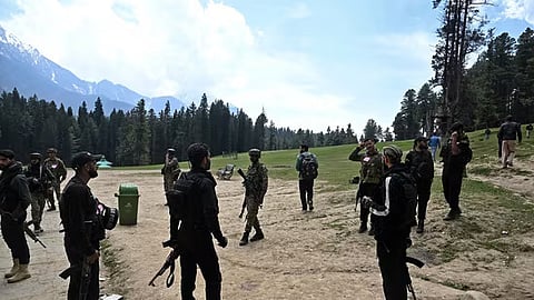 Security personnel at the site of the terror attack in Jammu and Kashmir's Pahalgam