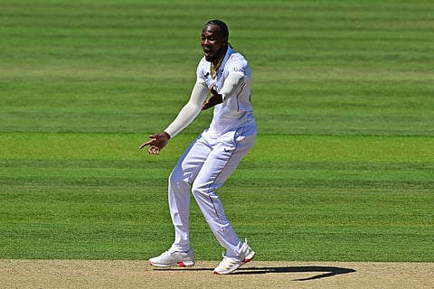 England's Jofra Archer reacts while bowling