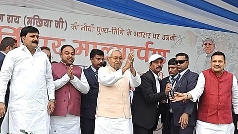 Dinesh Kumar Rai (in black coat and white cap) with CM Nitish Kumar at a function in Rojtas district.