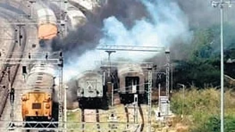 A train caught fire while it was moving towards Yard for cleaning, on Monday in Tirupati Railway Station.