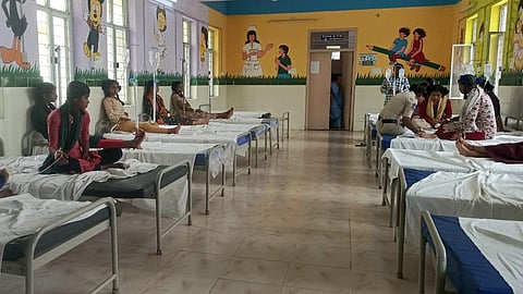 Students of Mudigonda Tribal Welfare Girls Ashram School are undergoing treatment for food poisoning at Devarakonda Government Hospital in Nalgonda