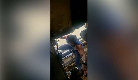 Ben Thampy releasing the air brake of the train