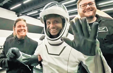 Astronaut Shubhanshu Shukla greets as he reaches Earth.