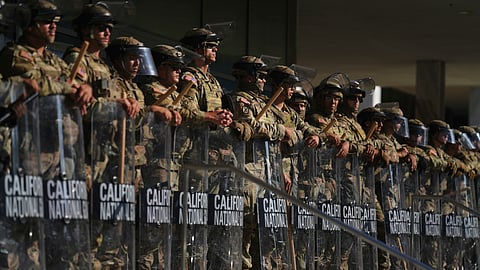 California National Guard are positioned at the Federal Building, June 10, 2025, in downtown Los Angeles.