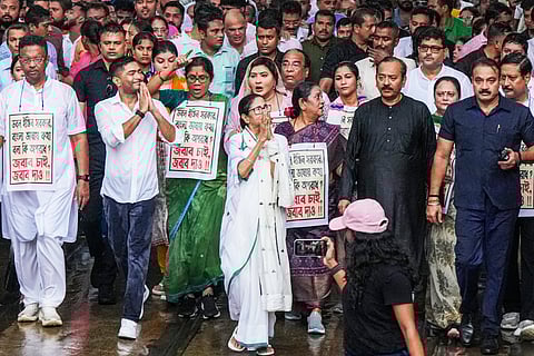 West Bengal Chief Minister and TMC chief Mamata Banerjee along with party National General Secretary Abhishek Banerjee and other leaders participates in a protest march against the alleged harassment of Bengali-speaking people in BJP-ruled states, in Kolkata, West Bengal, Wednesday, July 16, 2025.