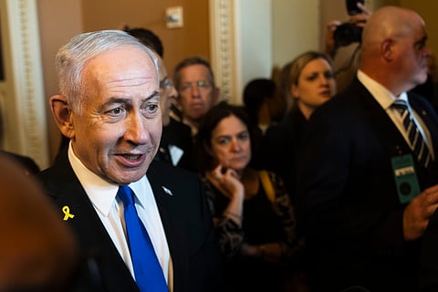 Israeli Prime Minister Benjamin Netanyahu speaks to reporters before a meeting with lawmakers at the Capitol in Washington, Wednesday, July 9, 2025.